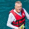 Bill getting ready to snorkle.  the water was choppy so the life preserver helped